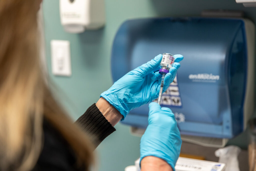 Nurse with syringe about to inject Botox for migraines in Nashville